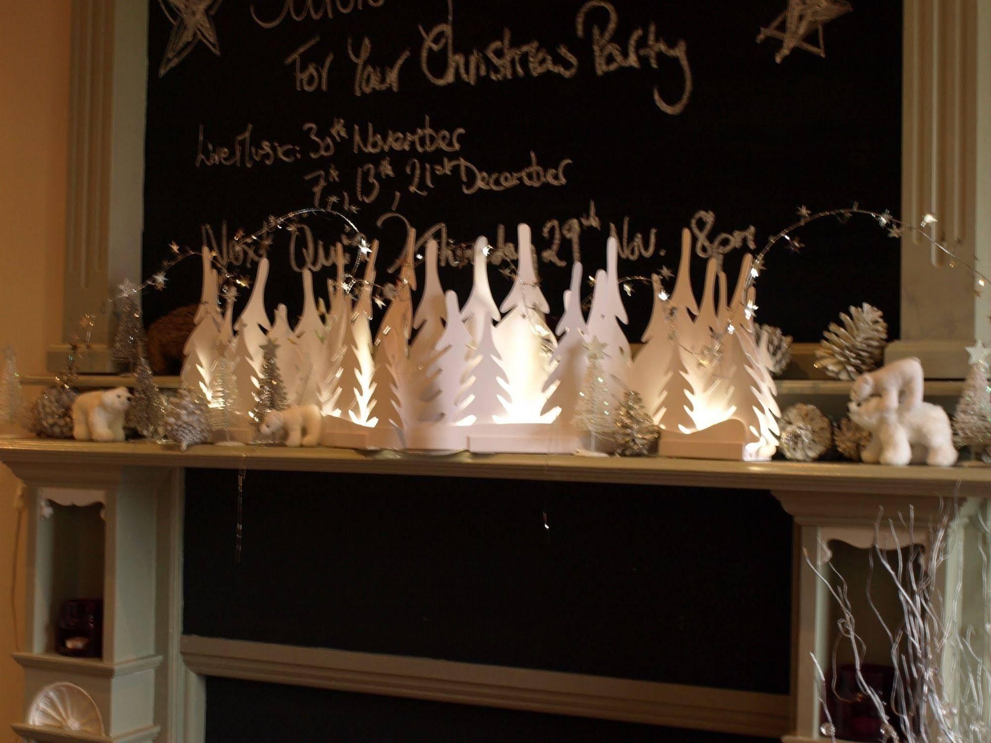 The Bower Inn Bridgwater Kültér fotó A fireplace decorated for Christmas